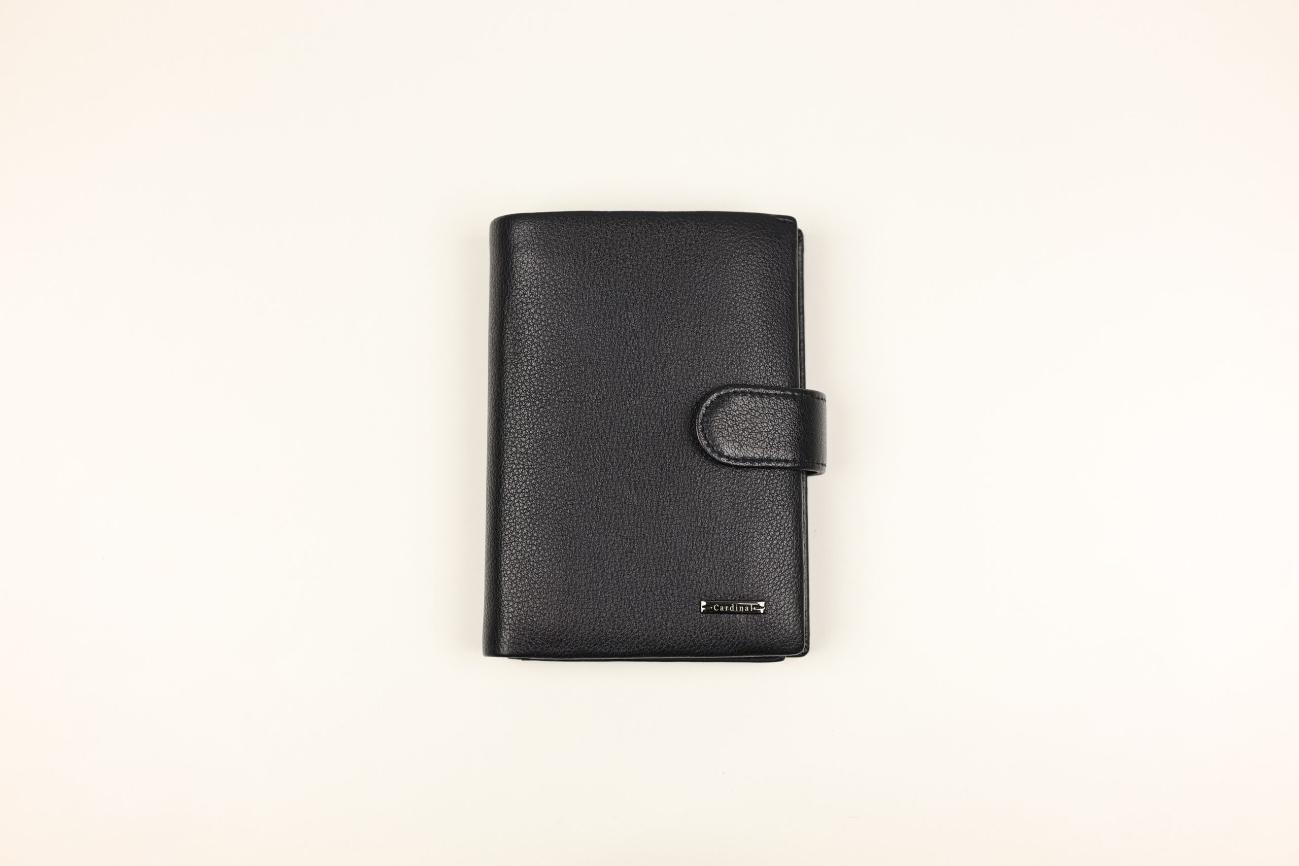 Чоловіче шкіряне портмоне Cardinal вертикальне на кнопці