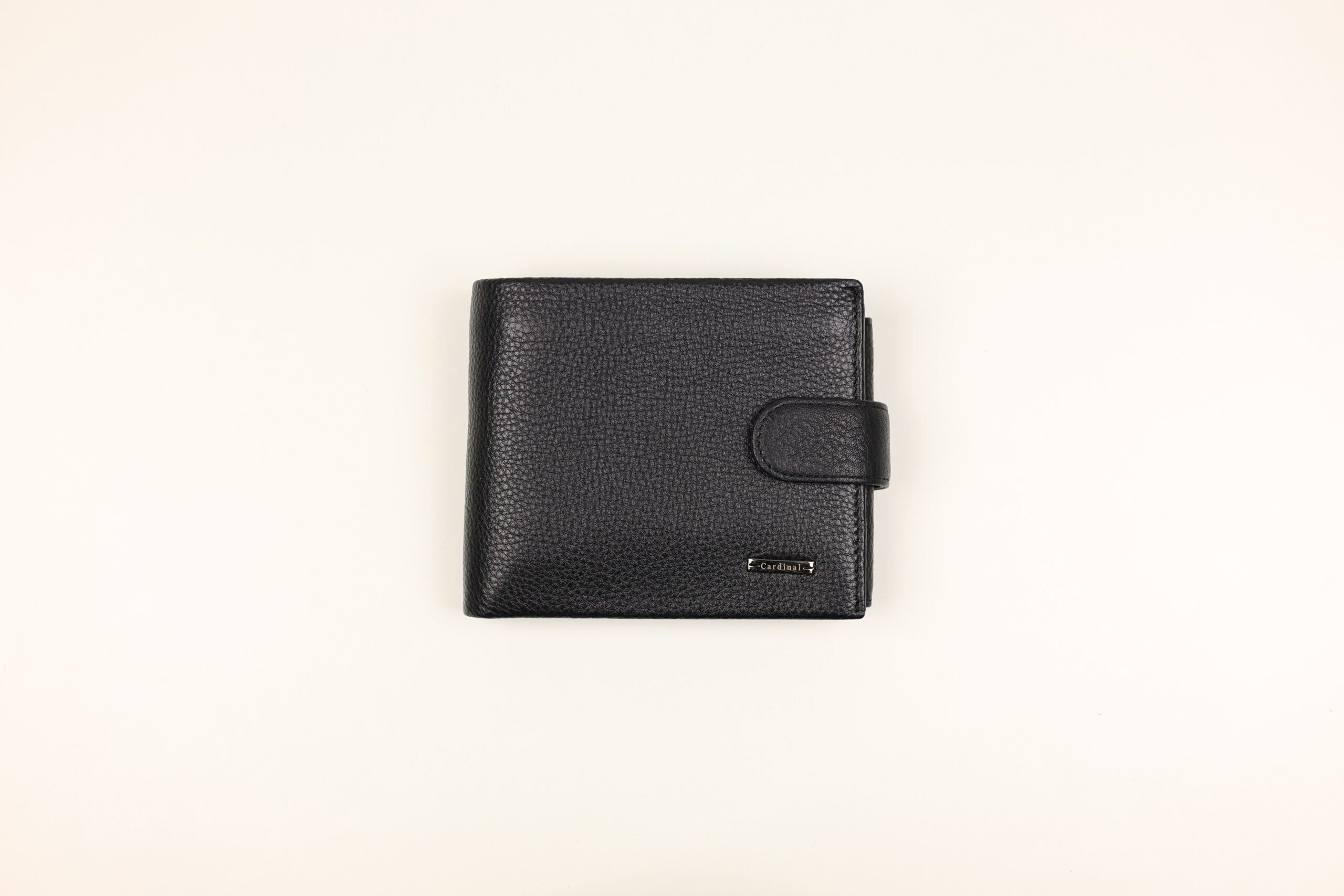 Чоловіче шкіряний гаманець Cardinal горизонтальне на кнопц