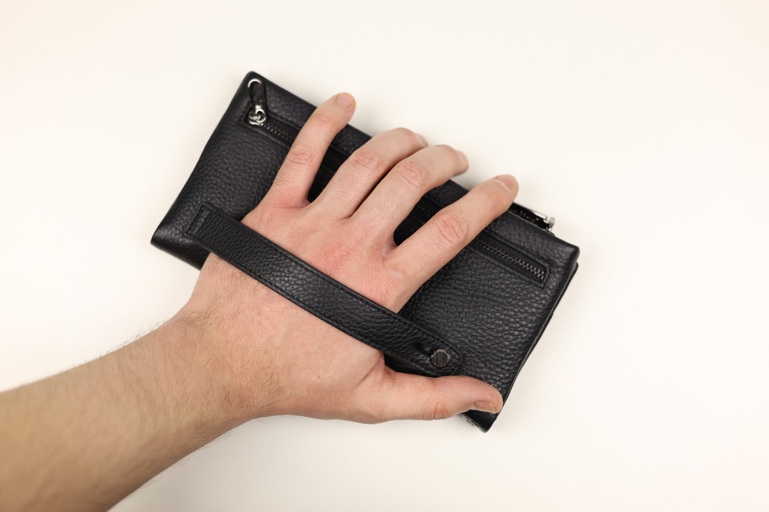 Чоловічий шкіряний клатч cardinal з ремінцем для руки (гаманець на блискавці) Чоловічий шкіряний клатч cardinal з ремінцем для руки (гаманець на блискавці)